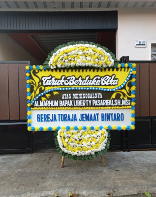 Papan Bunga Duka di Muruk Rian